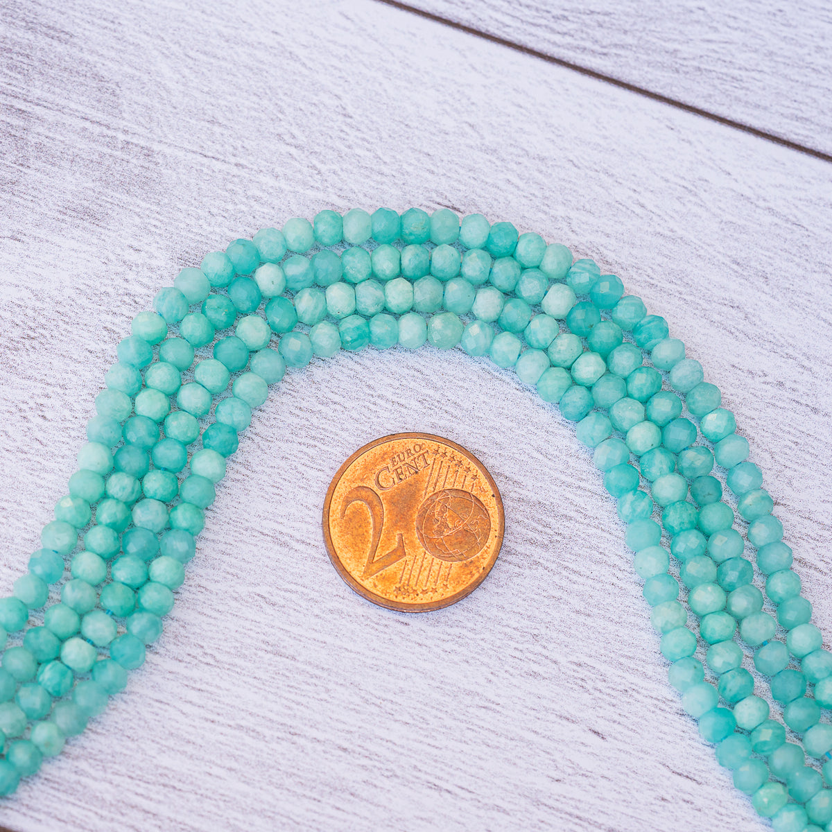 Perles rondelles facettes en Amazonite de 3,8 x 2,8 mm ( rang de env 134 perles )