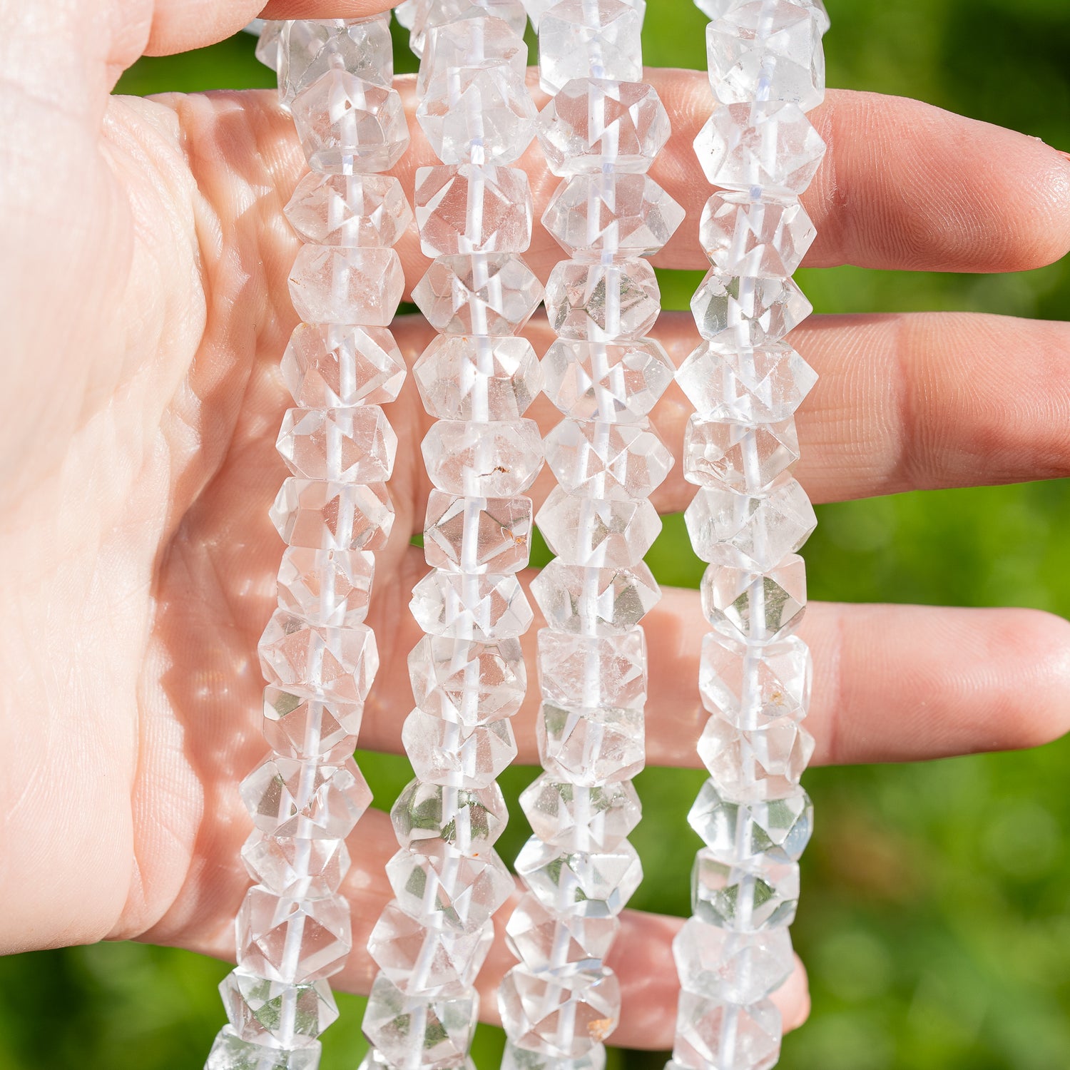 Perles pépites rondelles facettes de cristal de roche de env 9/10 mm ( lot de 4 perles )