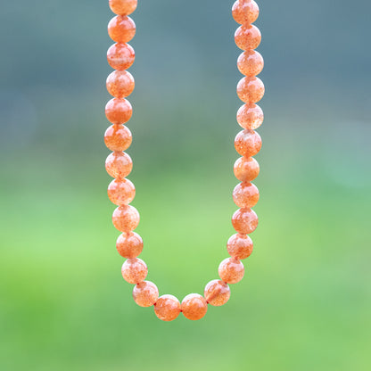 Perles rondes lisses de Pierre de soleil extra de 7 mm ( lot de 6 perles ou 1/2 rang )