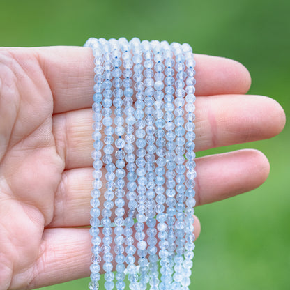Perles rondes facettes en Aigue-marine de 3 mm ( rang de env 128 perles )