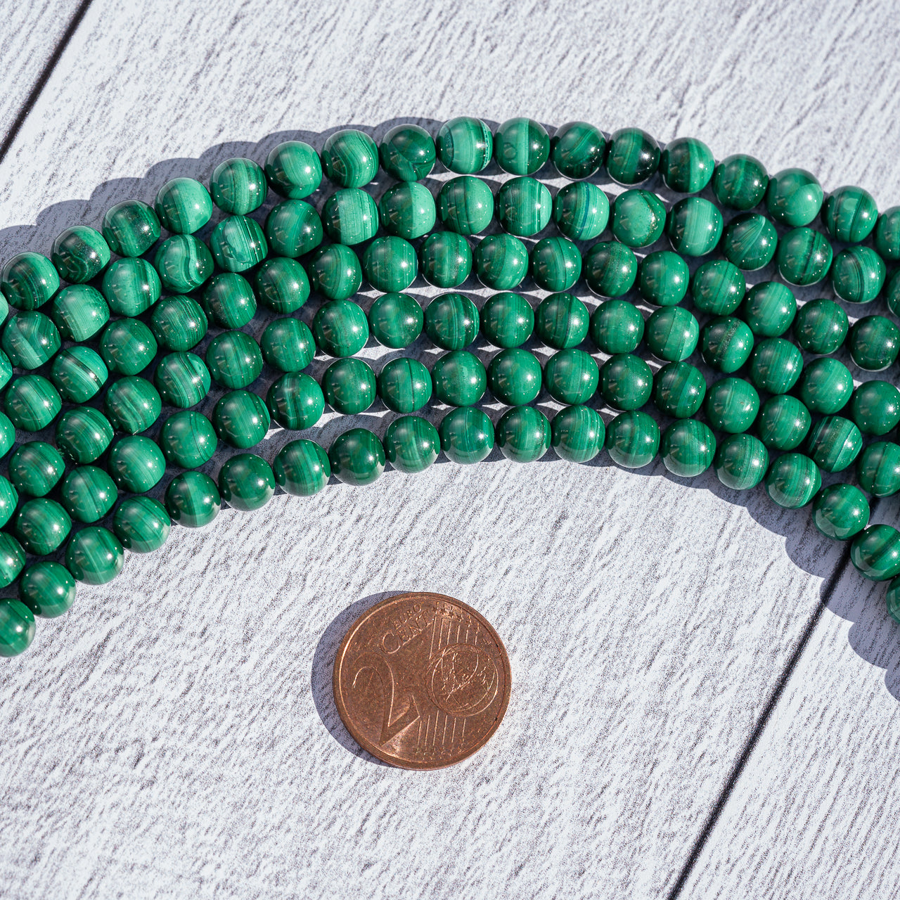 Perles rondes lisses de Malachite grade a de 6 mm ( 1/2 rang de env 30 perles )