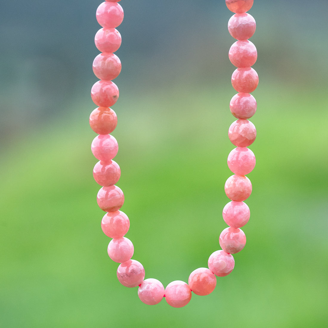 Perles rondes lisses de Rhodochrosite grade A de 8 mm ( Lot ou 1/2 rang )