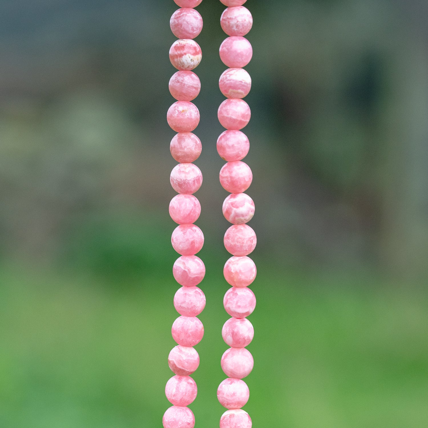 Perles rondes lisses de Rhodochrosite grade A de 8 mm ( Lot ou 1/2 rang )