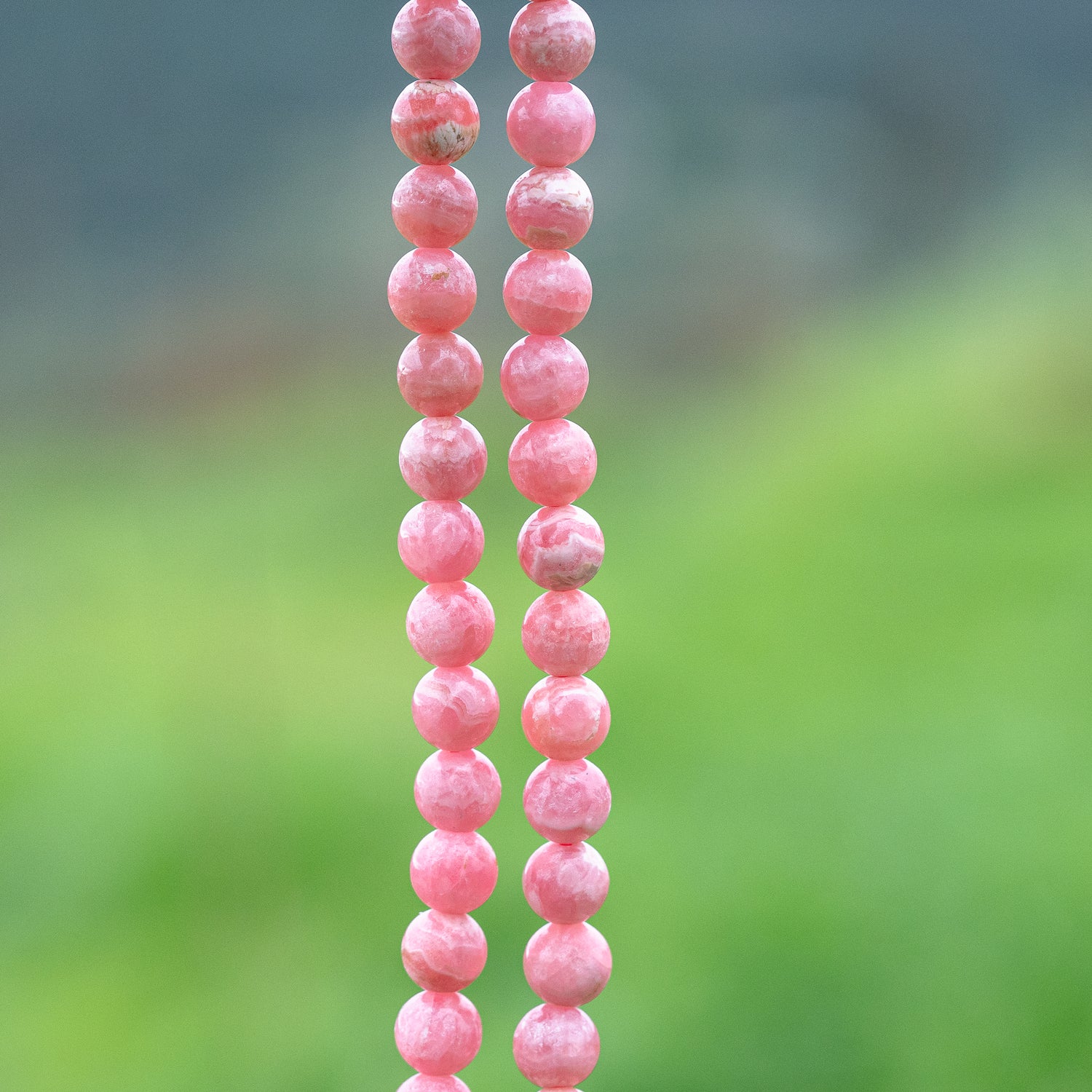 Perles rondes lisses de Rhodochrosite grade A de 8 mm ( Lot ou 1/2 rang )