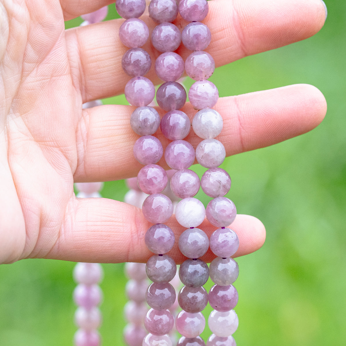 Perles rondes lisses de Quartz rose foncé de 8 mm ( 1/2 rang de env 23/24 perles )