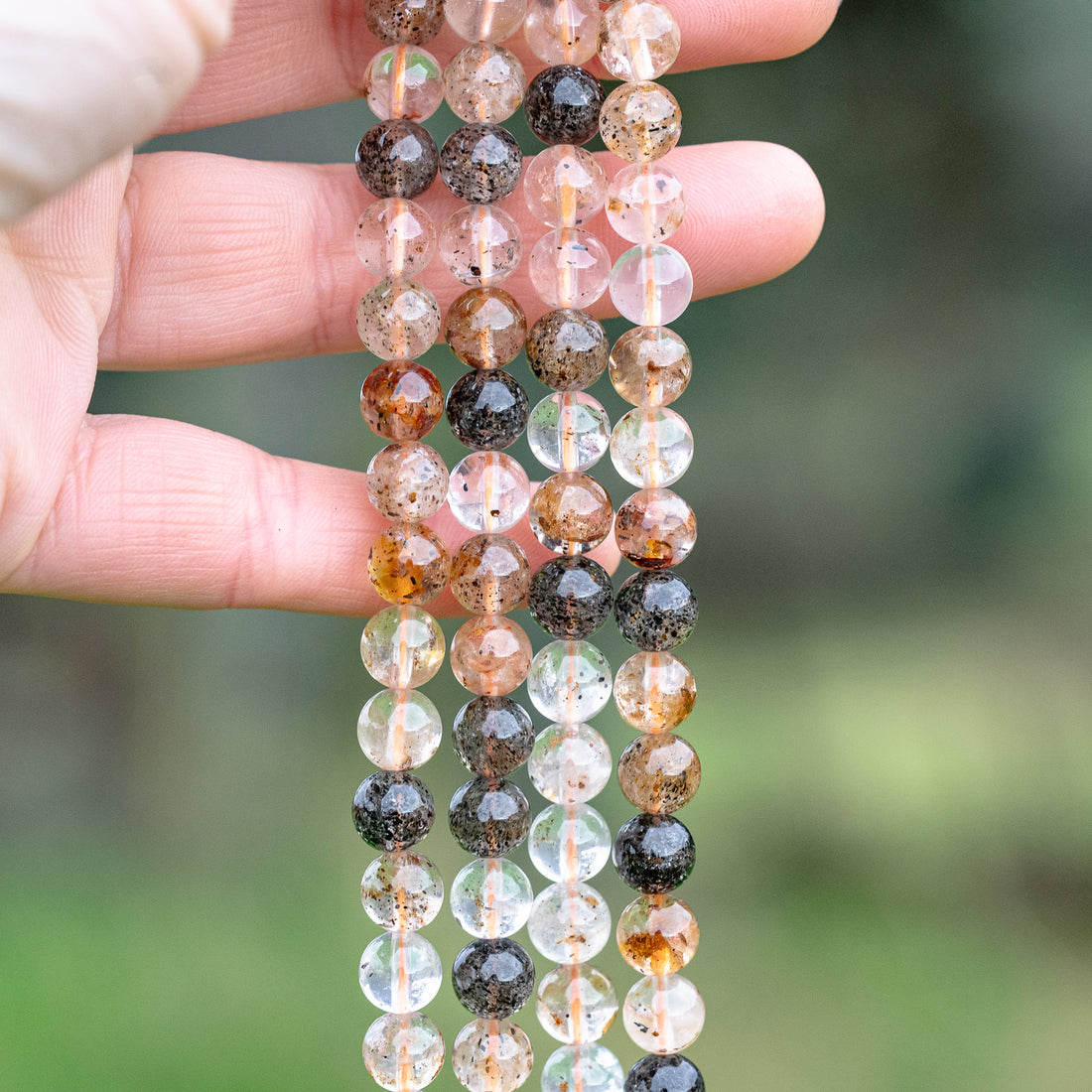 Perles rondes lisses de Quartz hématoide à inclusions de 8 mm ( 1/2 rang de env 24 perles )