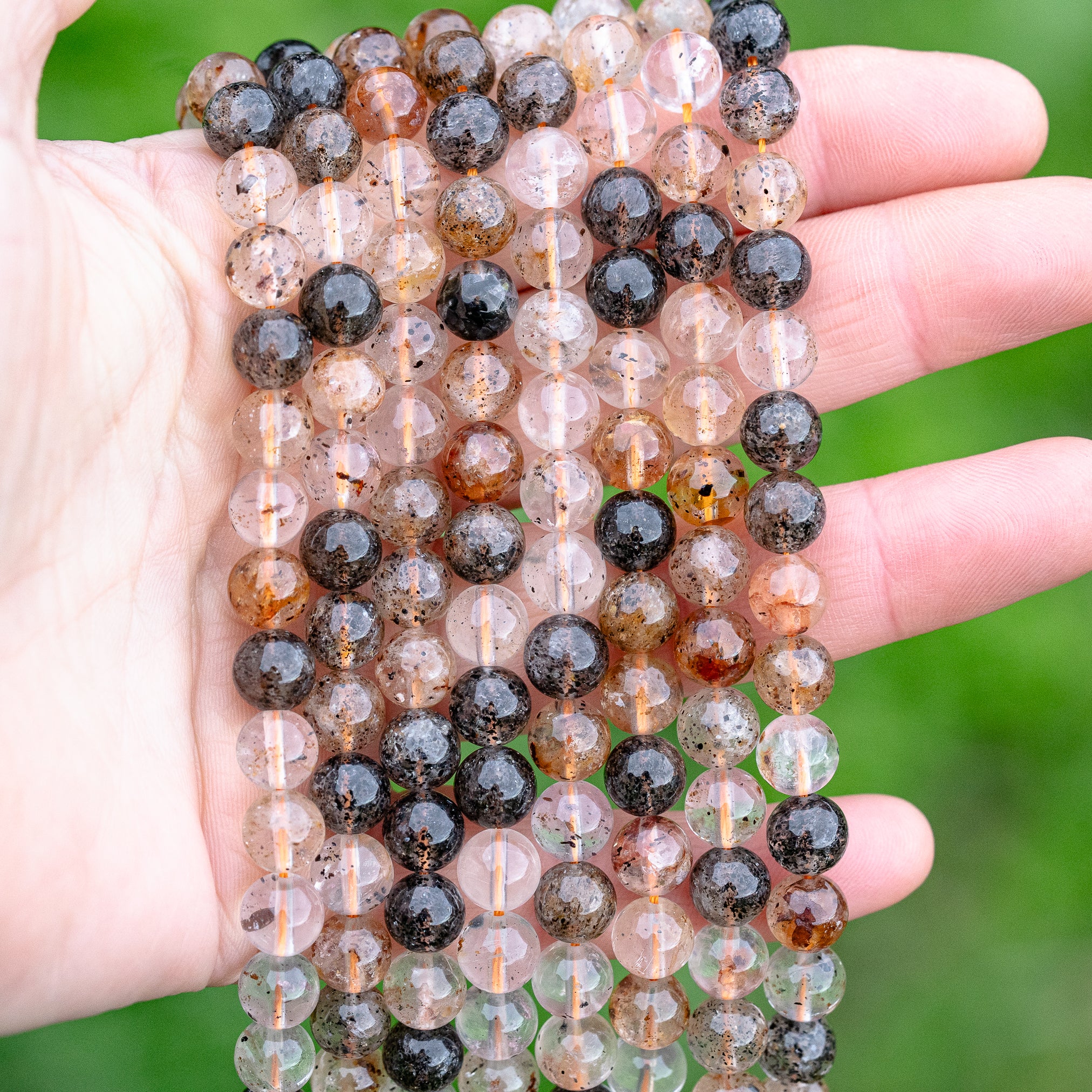 Perles rondes lisses de Quartz hématoide à inclusions de 8 mm ( 1/2 rang de env 24 perles )