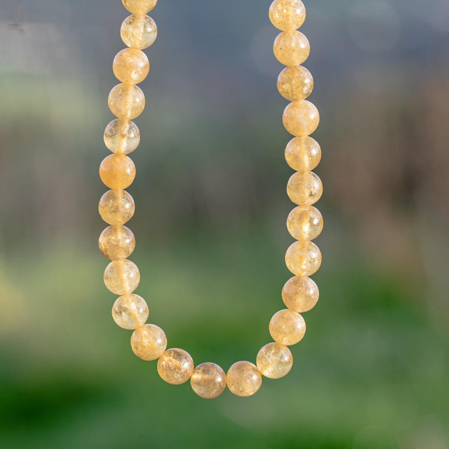 Perles rondes lisses de Grenat jaune de 7/8 mm ( 1/4 ou 1/2 rang )