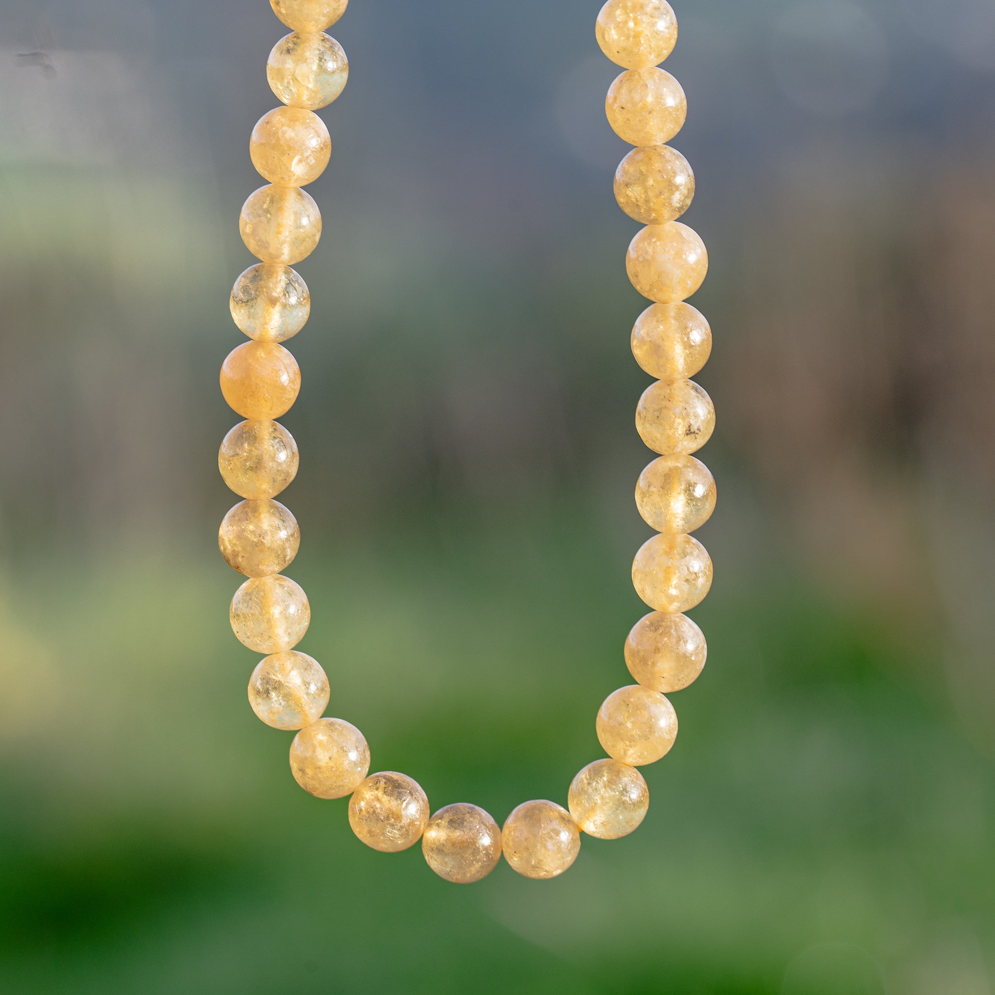 Perles rondes lisses de Grenat jaune de 7/8 mm ( 1/4 ou 1/2 rang )