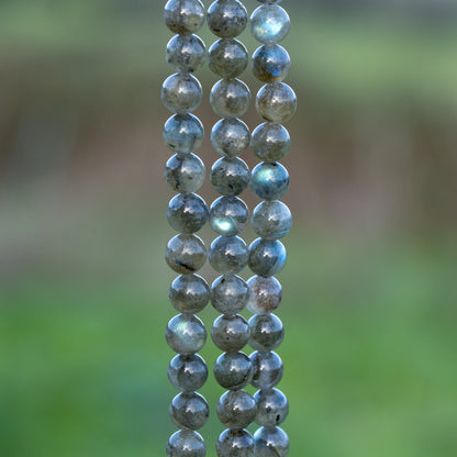 Perles rondes lisses de Labradorite de 8,5 mm ( 1/2 rang de env 23 perles )
