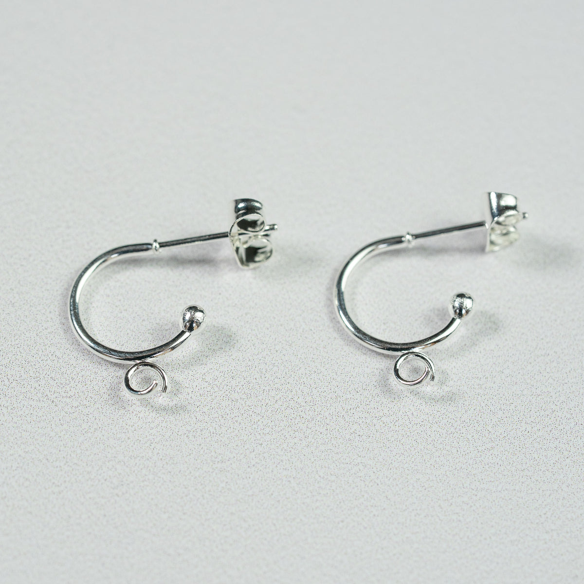 Demi-créoles avec boucle en acier inoxydable argenté de 12,5 mm ( la paire )
