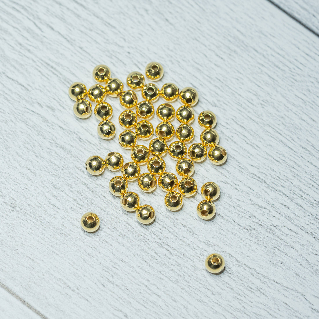 Perles rondes lisses laiton plaquées or 24K de 5 mm ( lot de 10 )