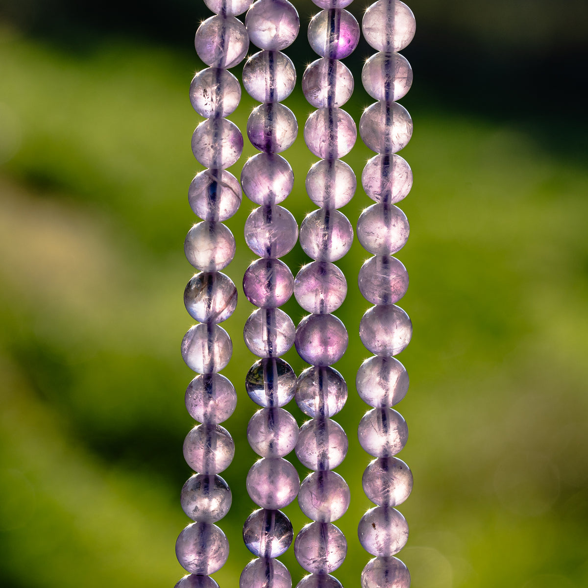 Perles rondes lisses en Améthyste violet clair de 8,5 mm ( rang de env 46 perles )