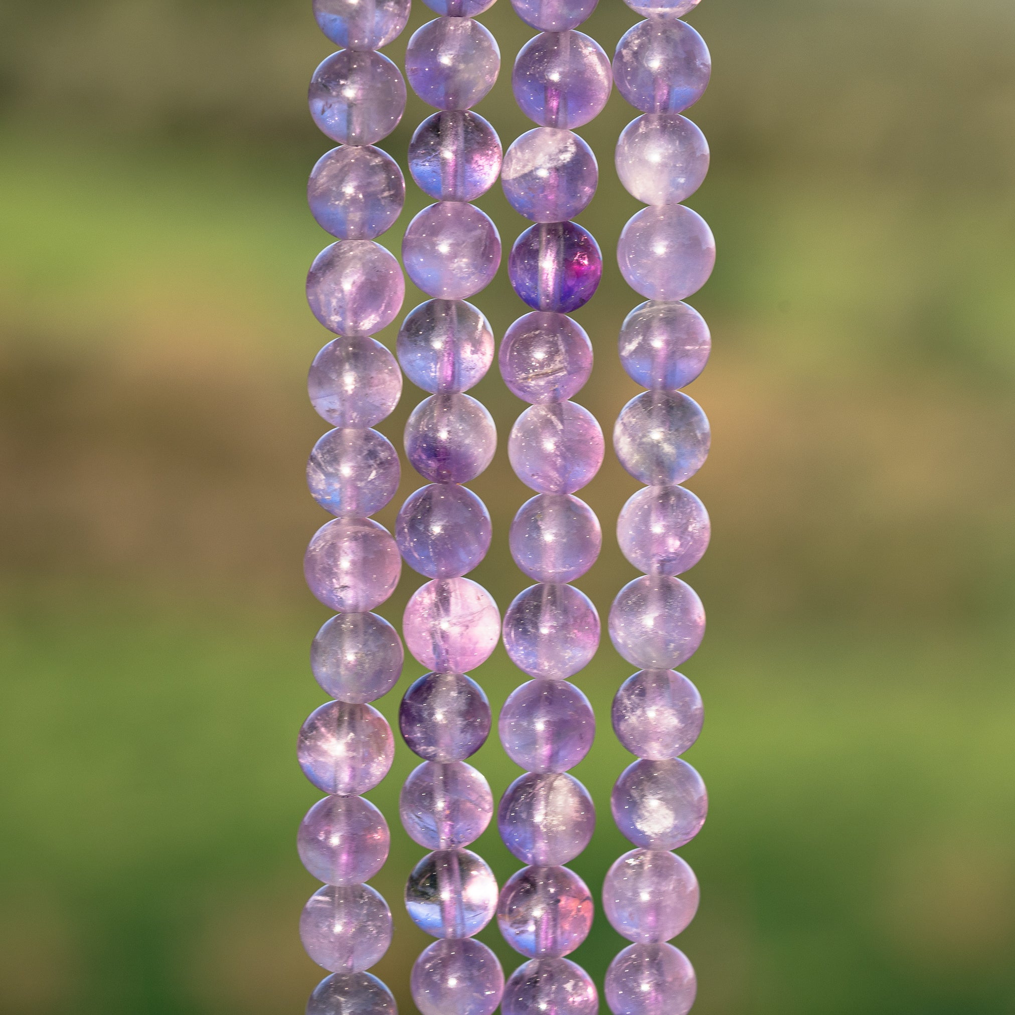 Perles rondes lisses en Améthyste violet clair de 8,5 mm ( rang de env 46 perles )