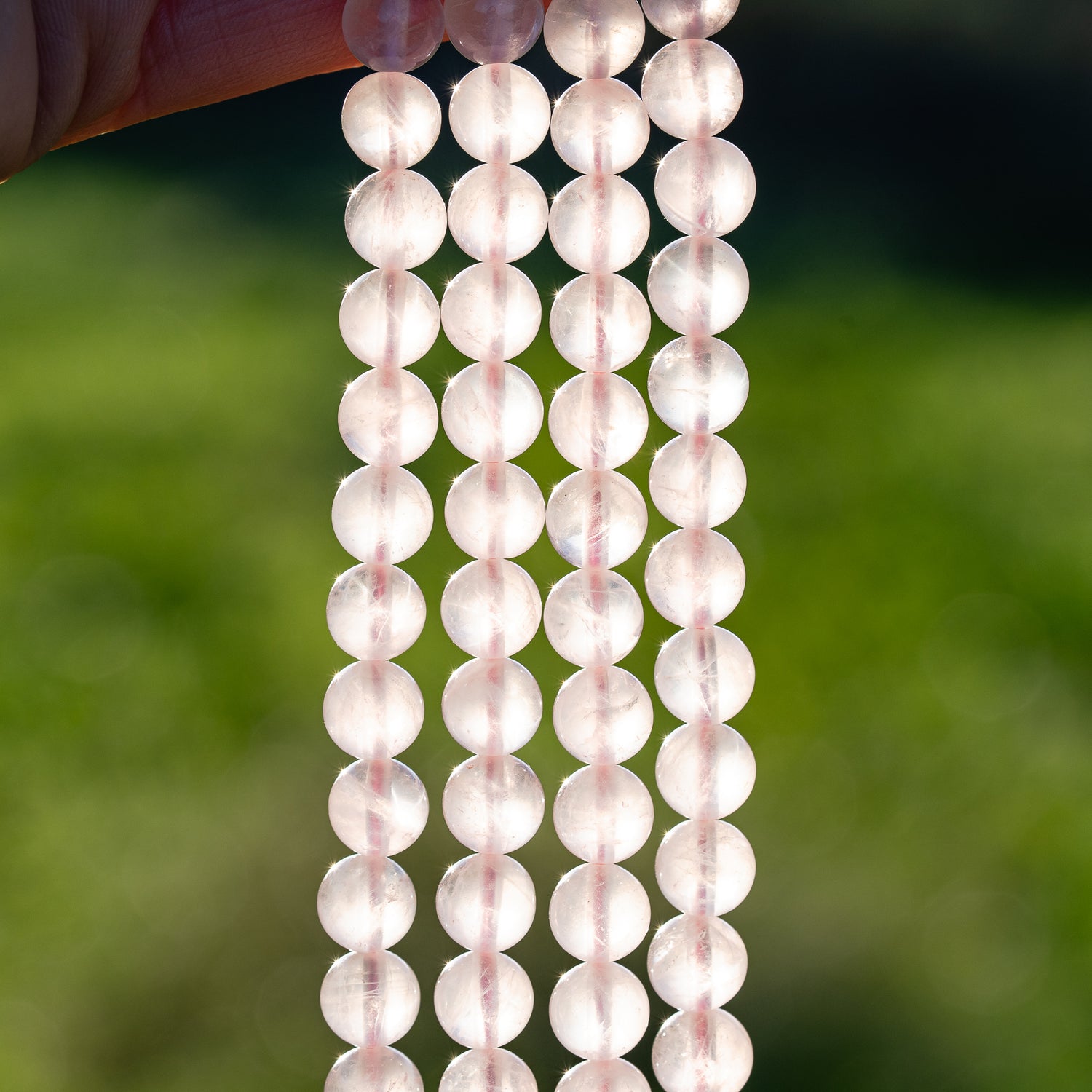 Perles rondes lisses de Quartz rose clair de 8 mm ( rang de env 48 perles )