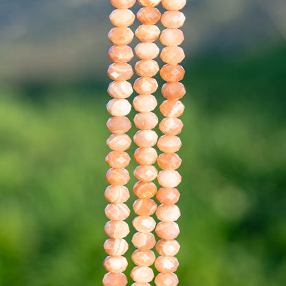 Perles rondelles facettes de Pierre de lune rose solaire de env 8 x 5,5  mm ( 1/2 rang de env 33/34 perles )
