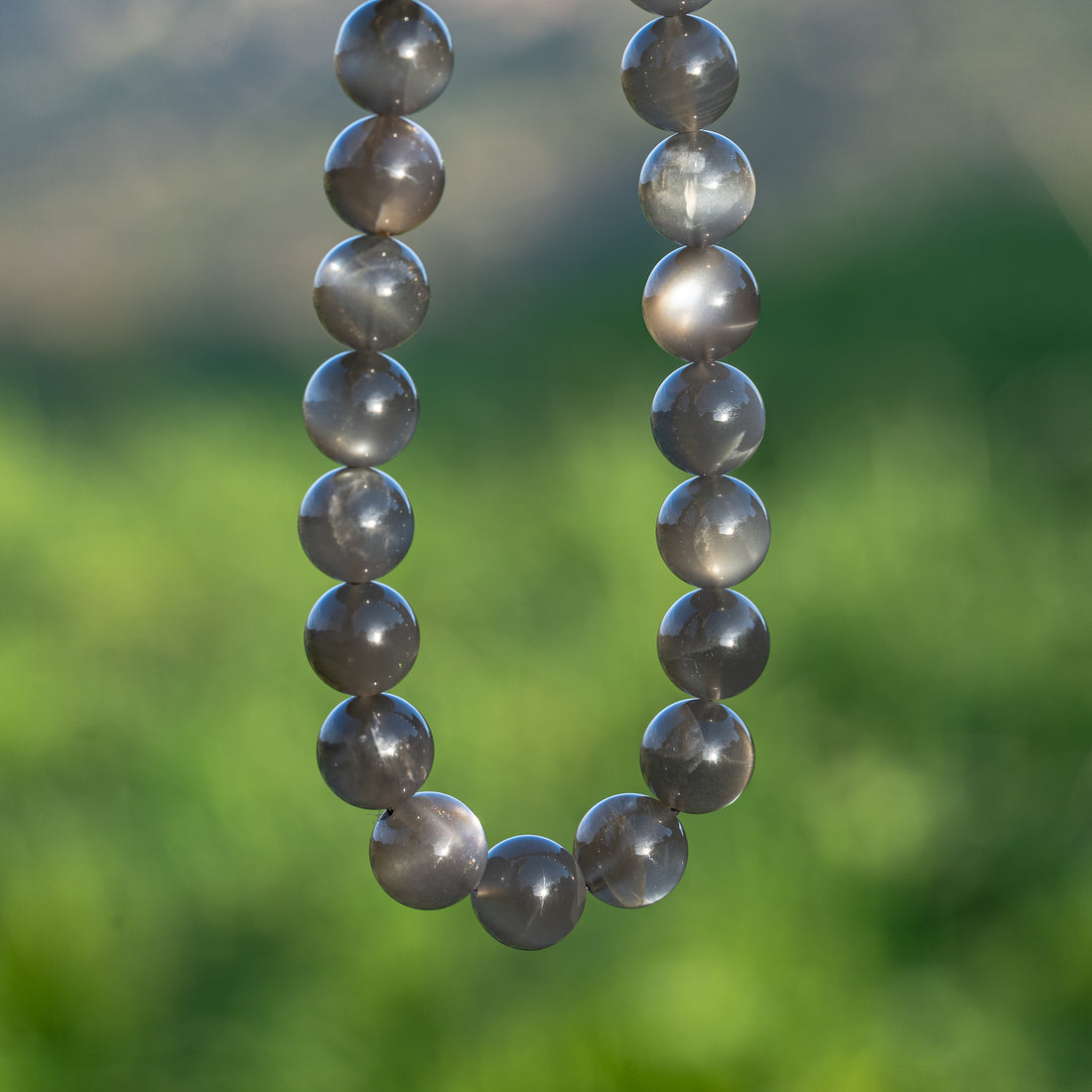 Perles rondes lisses de Pierre de lune noire grade A de 10,5 mm ( lot de 2 ou 10 perles )