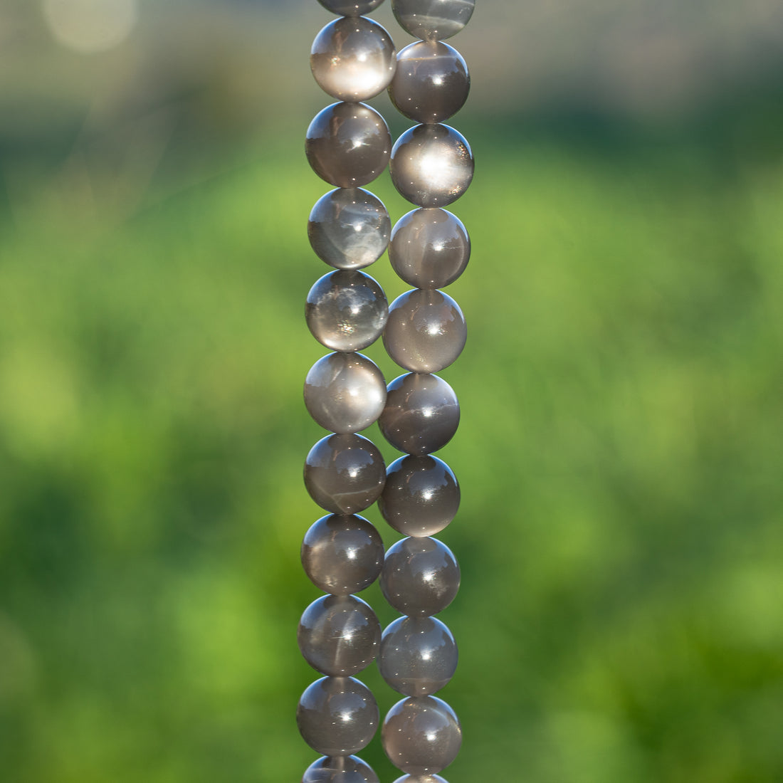 Perles rondes lisses de Pierre de lune noire grade A de 10,5 mm ( lot de 2 ou 10 perles )