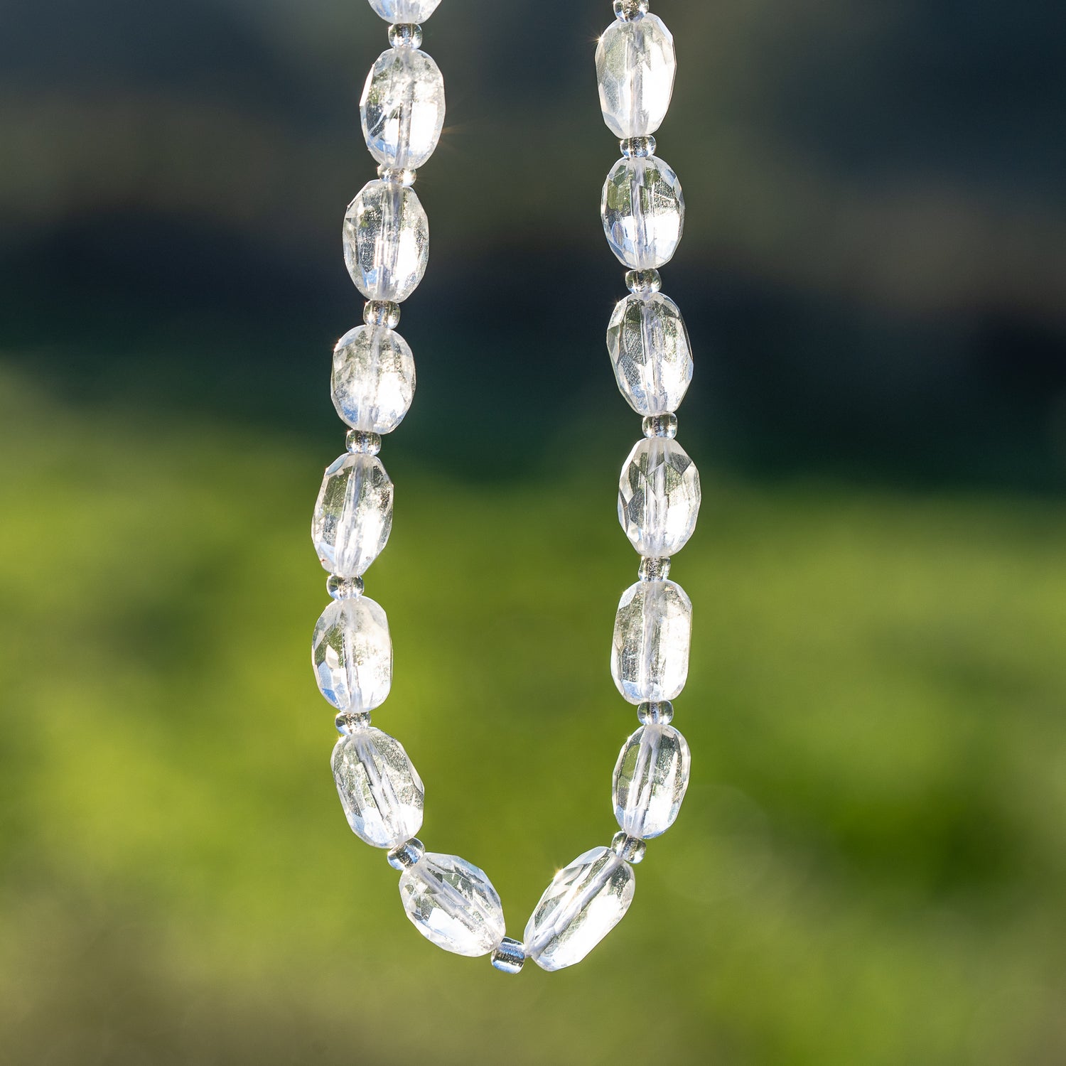 Perles ovales facettes de Cristal de roche de env 9/11 mm ( à l&