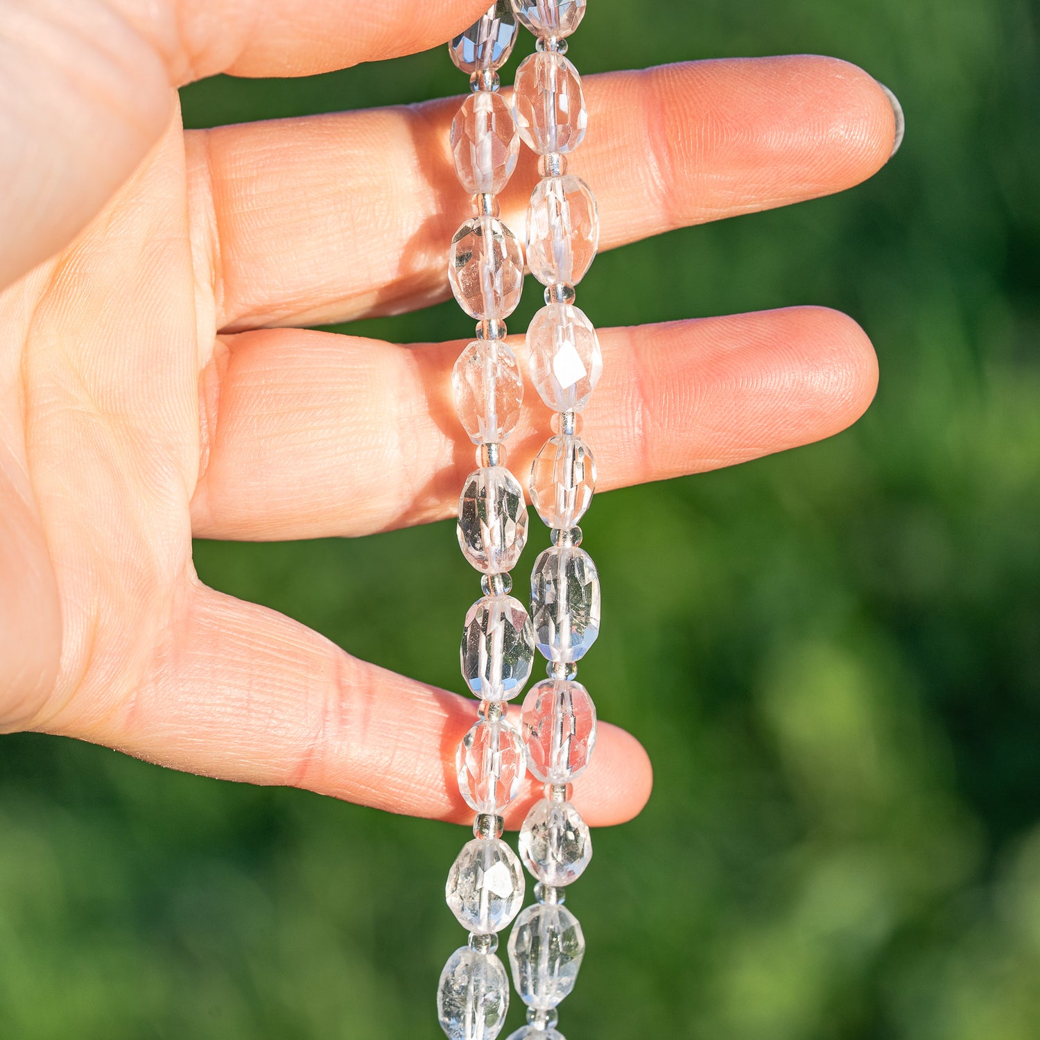 Perles ovales facettes de Cristal de roche de env 9/11 mm ( à l&