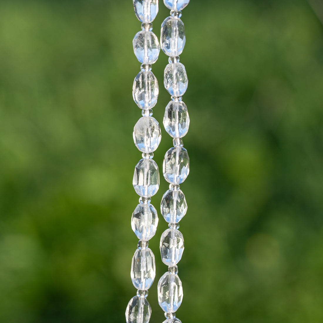 Perles ovales facettes de Cristal de roche de env 9/11 mm ( à l&