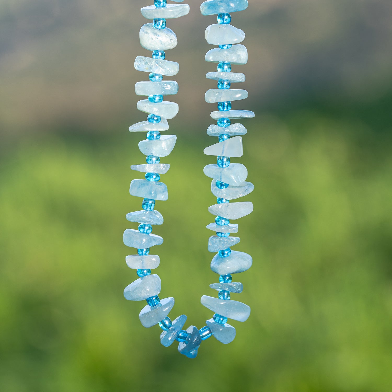 Perles pépites en Aigue-marine de env 10 mm ( rang de env 68 perles )