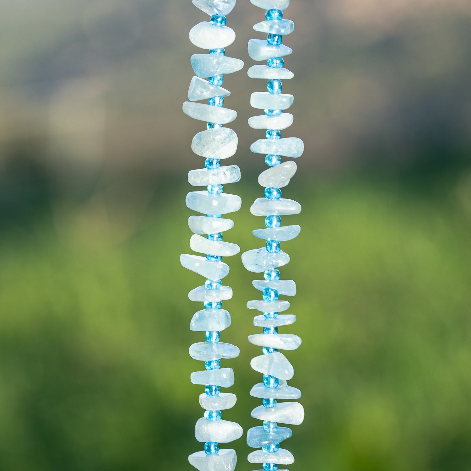 Perles pépites en Aigue-marine de env 10 mm ( rang de env 68 perles )