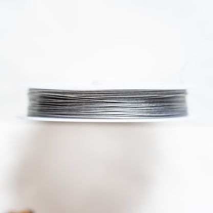Fil câblé en acier inoxydable argenté de 0,38 mm ( bobine de 60 mètres )