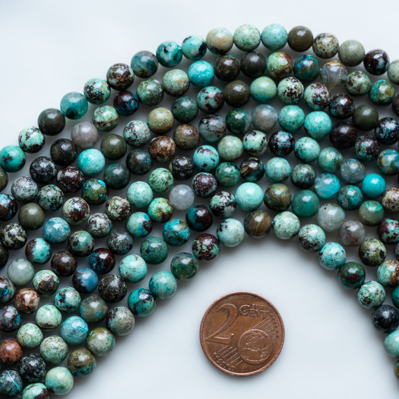 Perles rondes de Chrysocolle de 5,5 et 6 mm ( 1/2 rang de 33 et 36 perles )