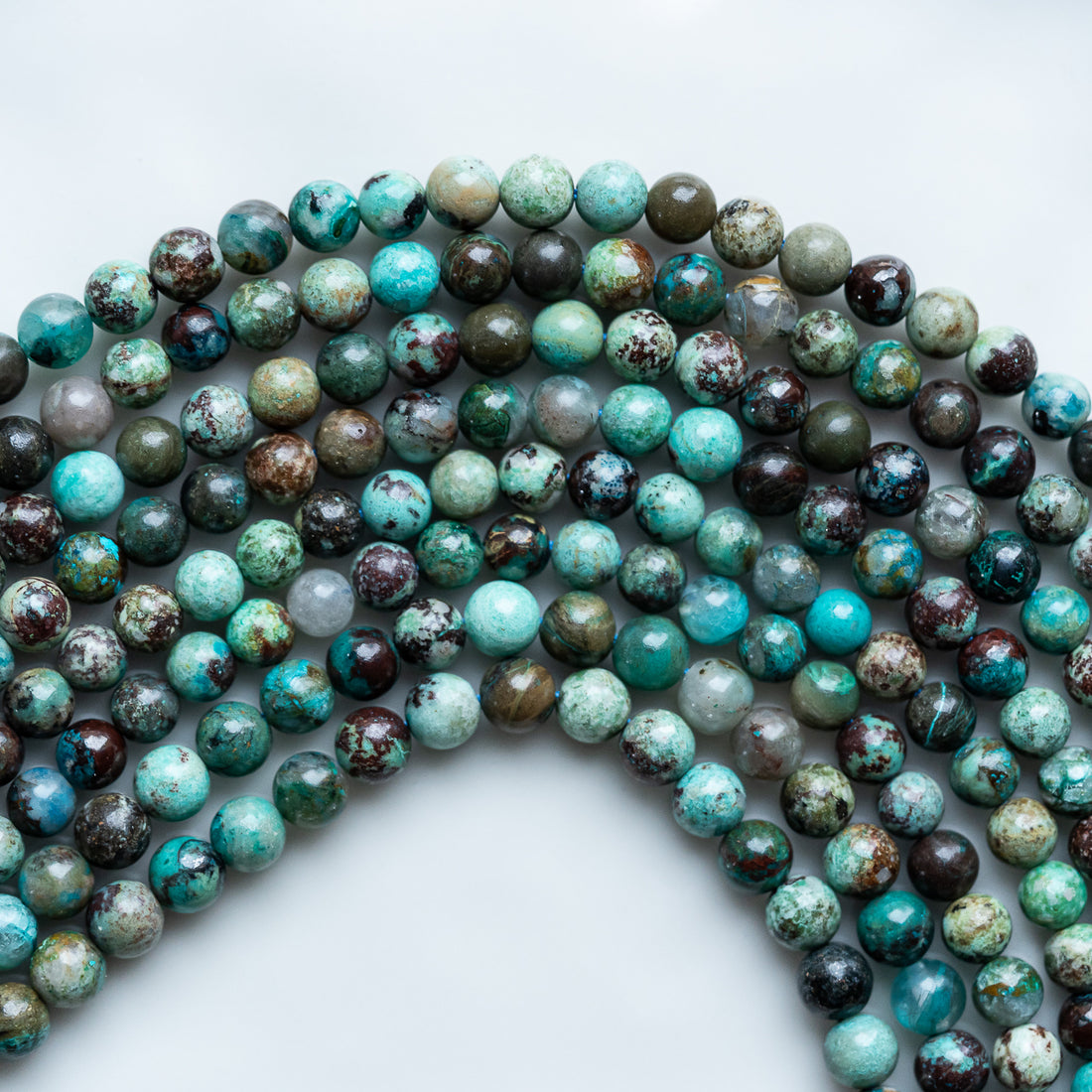 Perles rondes de Chrysocolle de 5,5 et 6 mm ( 1/2 rang de 33 et 36 perles )