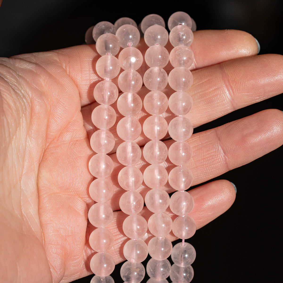 Perles rondes lisses de Quartz rose clair de 8 mm ( rang de env 48 perles )