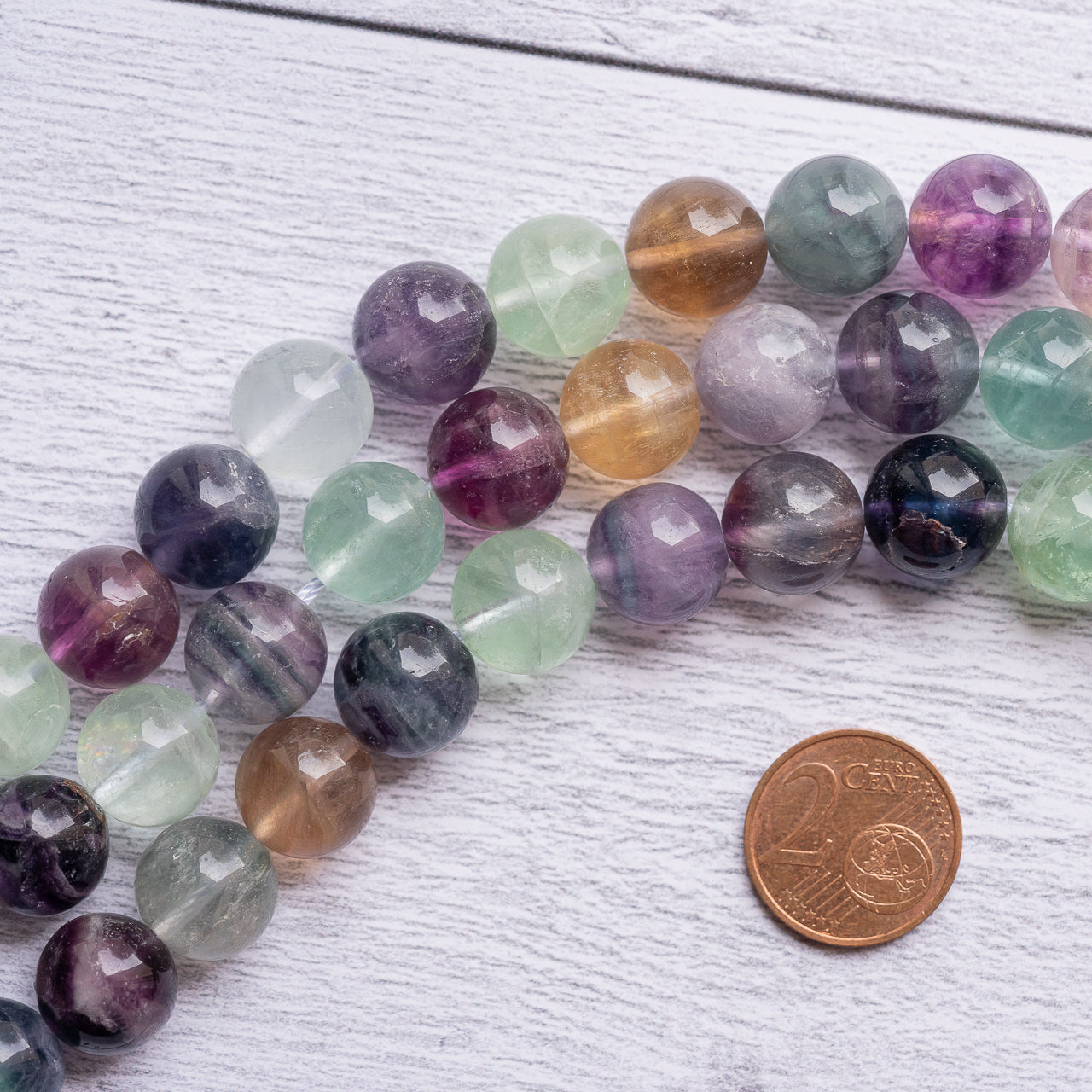 Perles rondes de Fluorite multicolore de 12,5 mm ( 1/2 rang de env 16 perles )