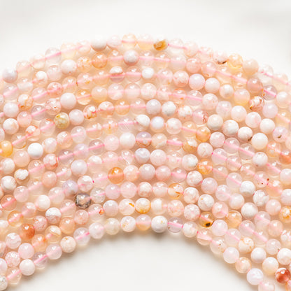 Perles rondes en lisses en Agate fleur de cerisier de 6,5 mm ( rang de env 59 perles )