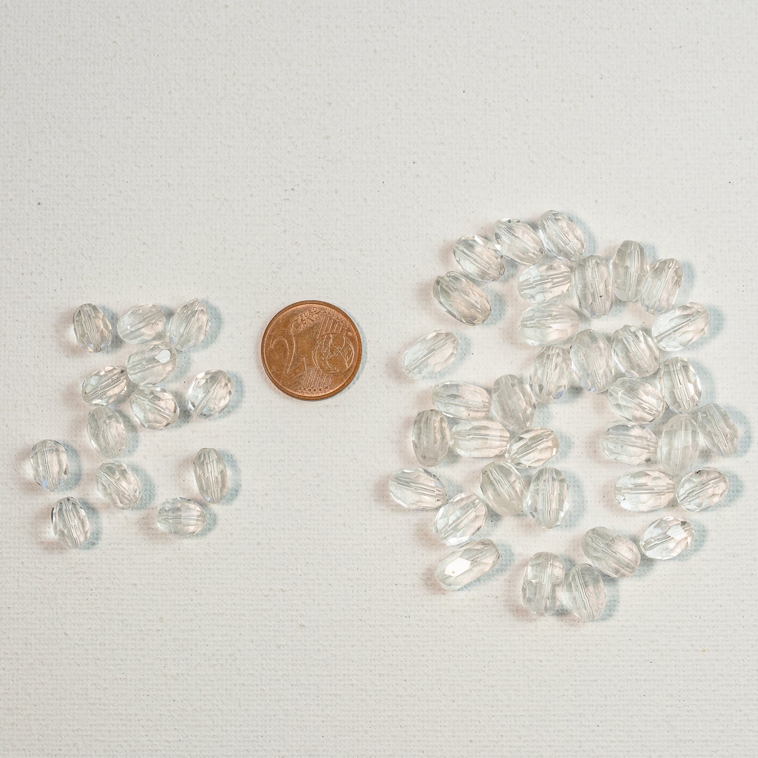 Perles ovales facettes de Cristal de roche de env 9/11 mm ( à l&