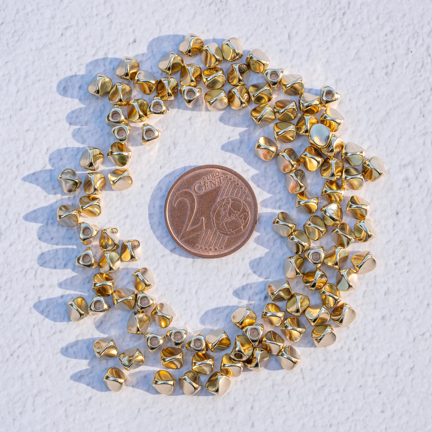 Perles &quot; twistées &quot; en laiton plaqué or 24k de 4,5 mm ( lot de 4 )