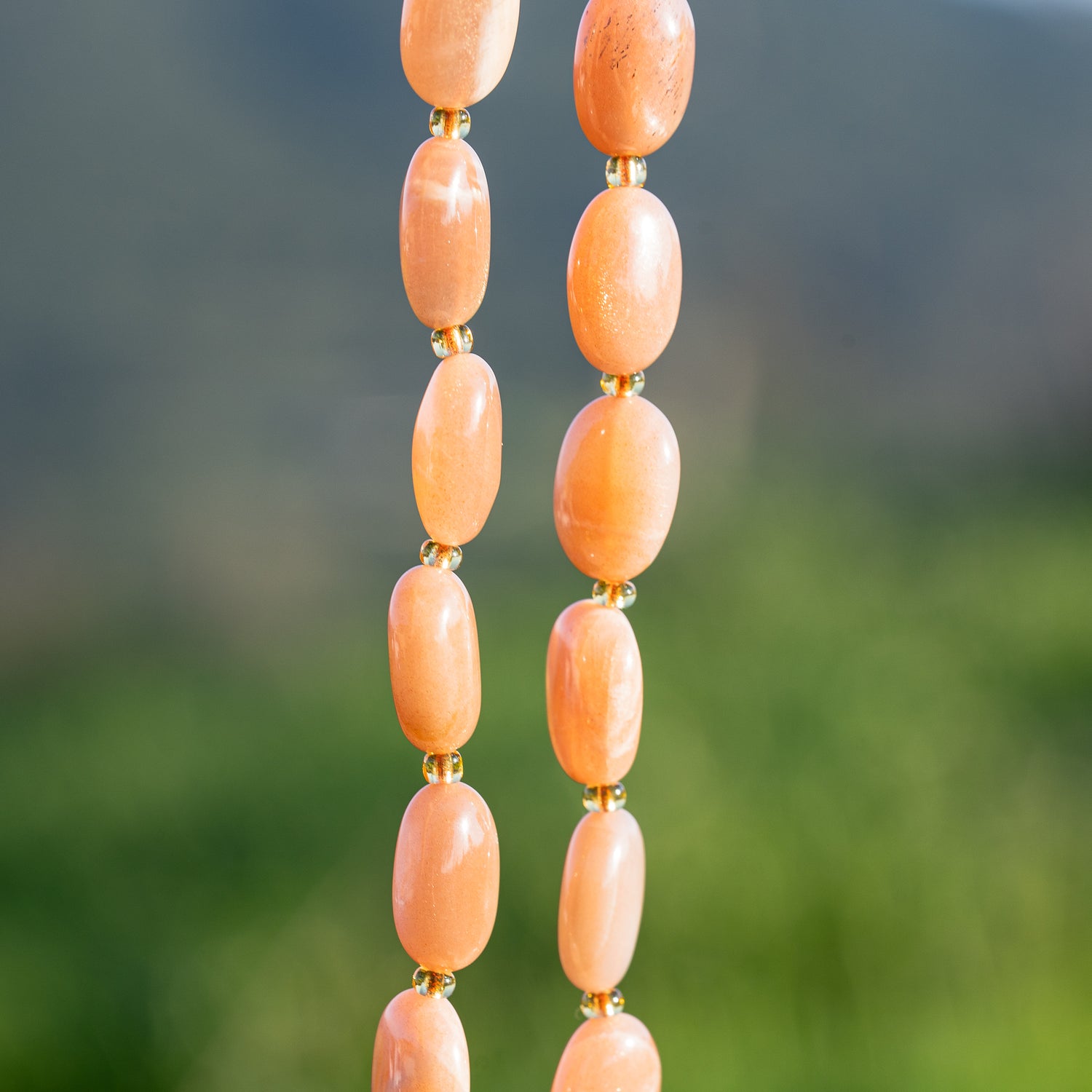 Perles ovales lisses de Pierre de lune rose de env 14 mm ( à l&