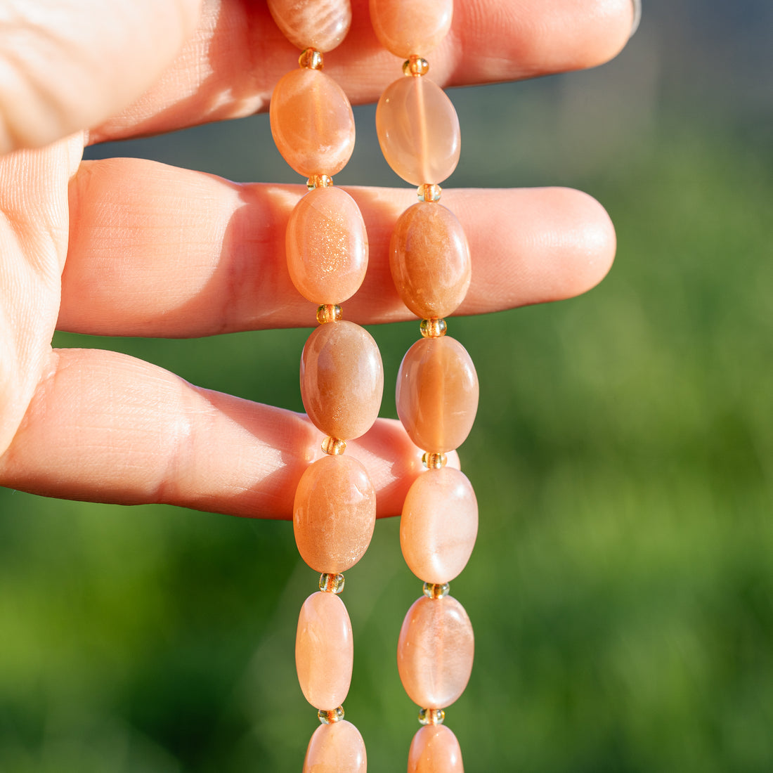 Perles ovales lisses de Pierre de lune rose de env 14 mm ( à l&