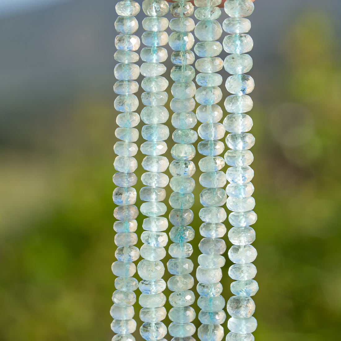 Perles rondelles facettes en Aigue-marine de env 6/7,5 x 3,5/5 mm ( lot de 2 perles )