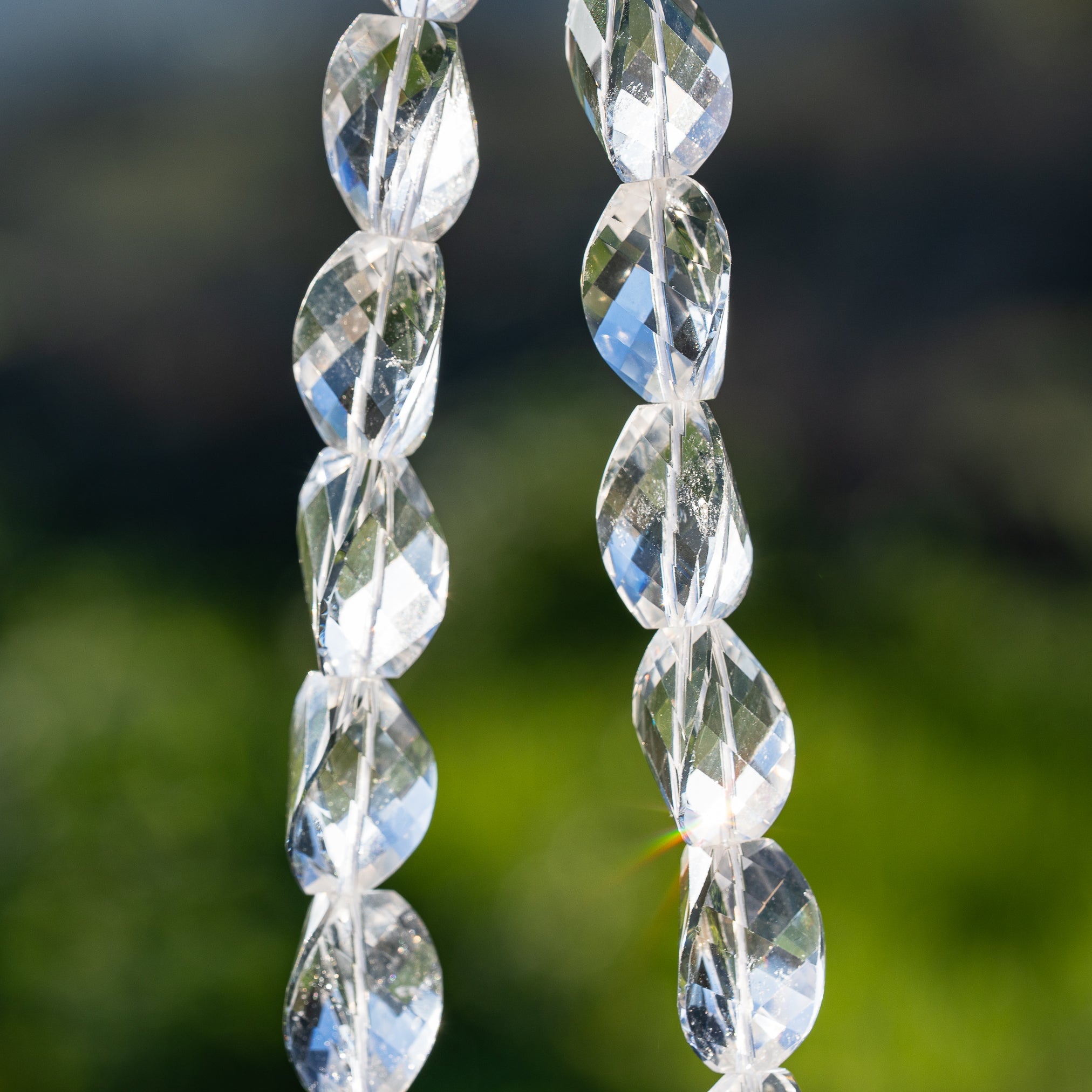 Perles torsadées facettes en cristal de roche clair de env 16/19 mm ( à l&