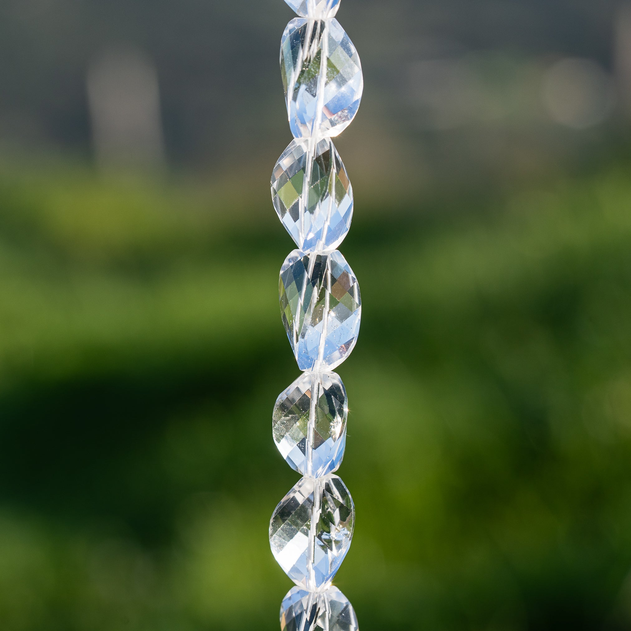 Perles torsadées facettes en cristal de roche clair de env 16/19 mm ( à l&