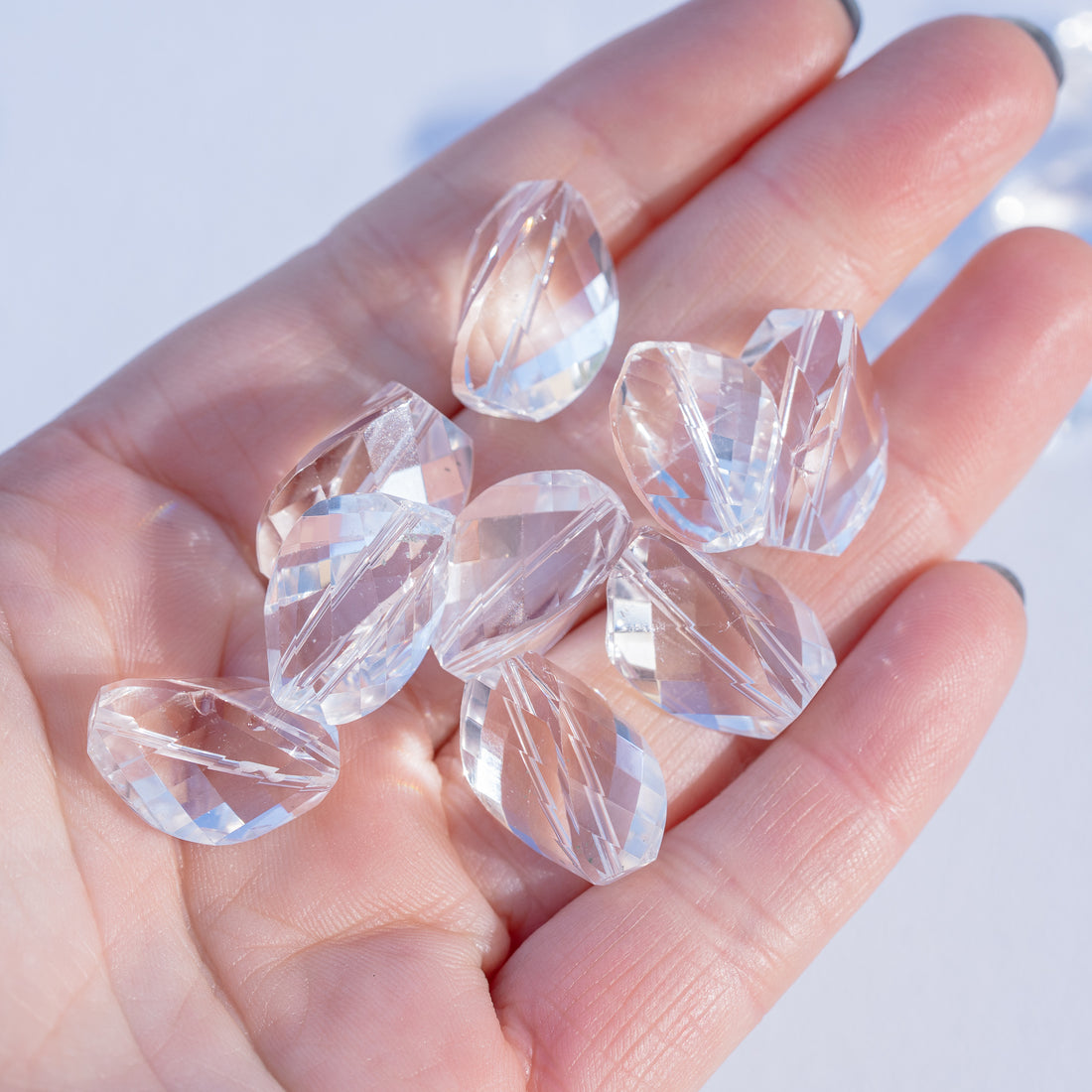 Perles torsadées facettes en cristal de roche clair de env 16/19 mm ( à l&