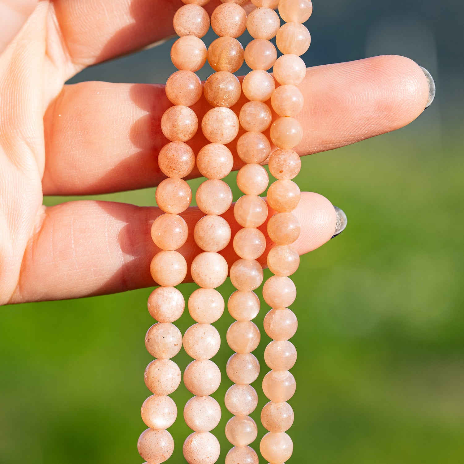 Perles rondes lisses de Pierre de soleil de 6 mm ( par 1/2 rang )