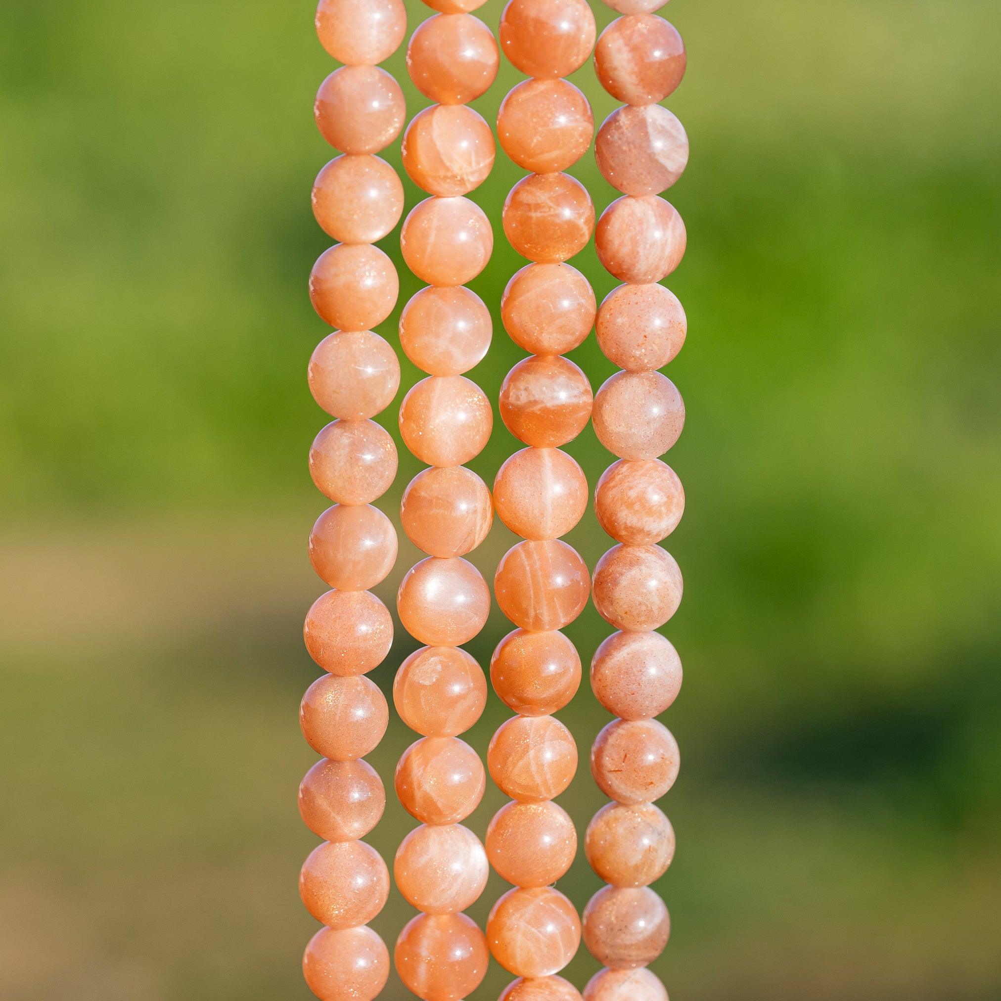 Perles rondes lisses de Pierre de soleil de 6/8 mm ( par rang ou 1/2 rang au choix )