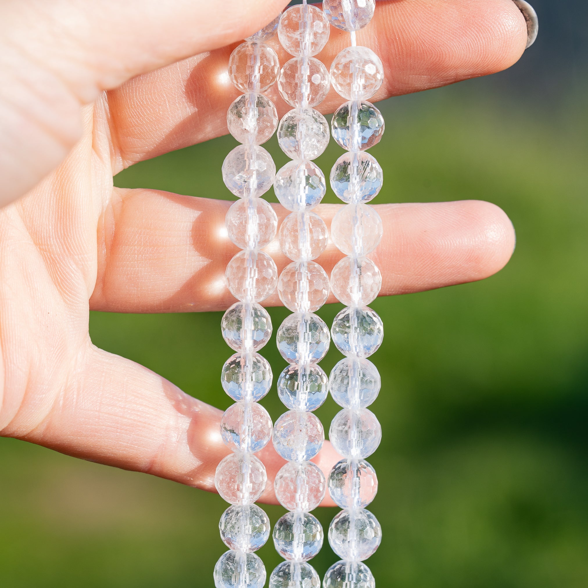 Perles rondes facettes de Cristal de roche de 8,5 mm ( rang de env 45 perles )