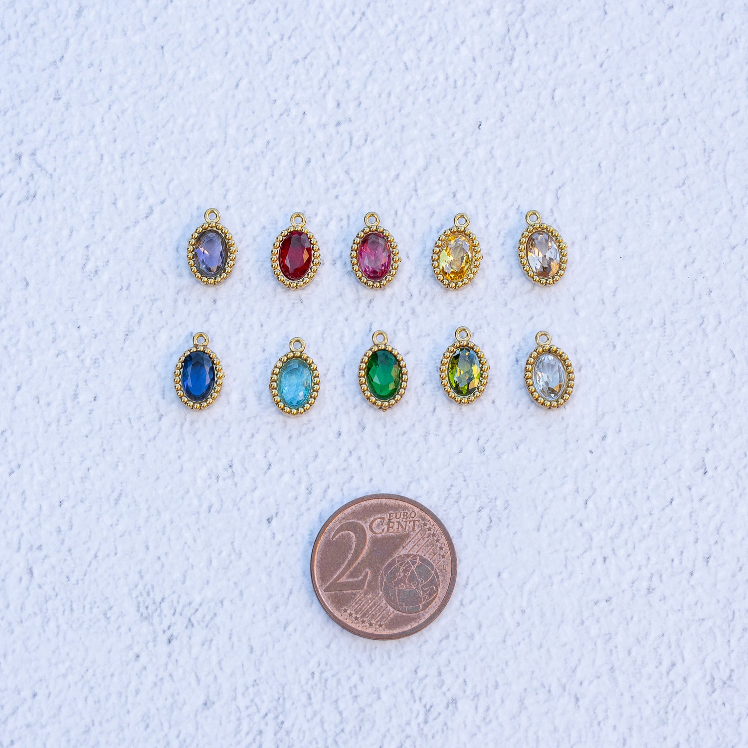 Breloques ovales en acier inox plaqué or 18k et zirconium colorés au choix de 10,5 mm ( à l&