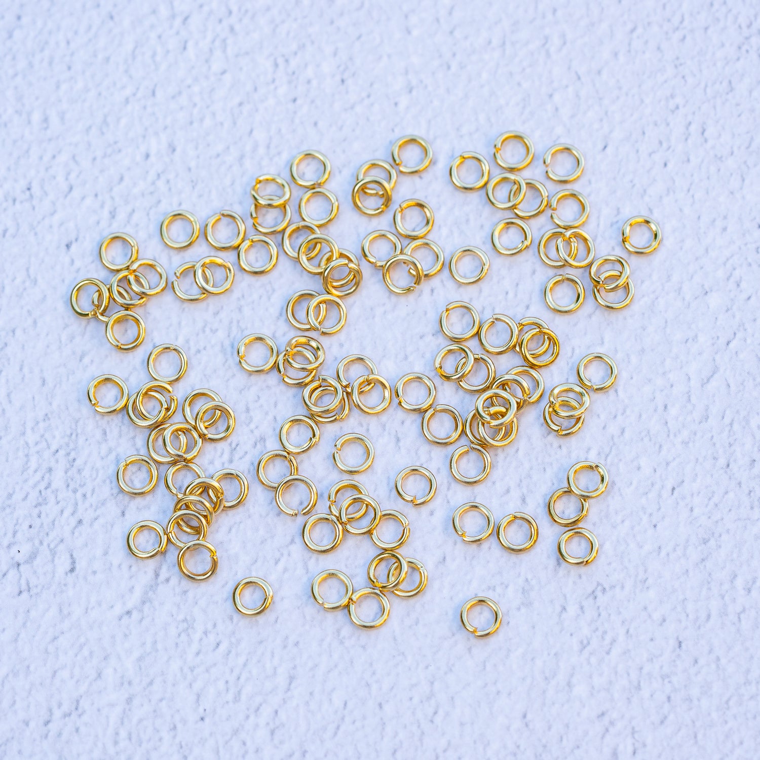 Anneaux de jonction ronds en acier inox plaqué or 24k de 5 x 1 mm ( lot de 10 )