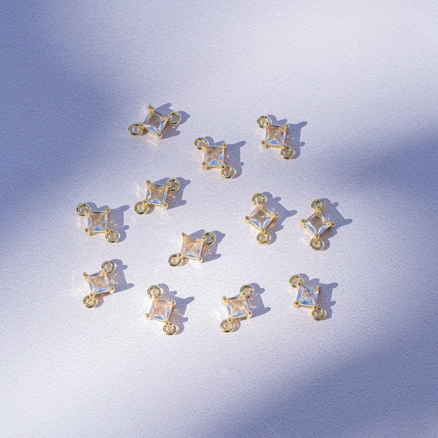 Connecteur losange en laiton plaqué or 18 k et zirconium de 10,5 mm ( à l&