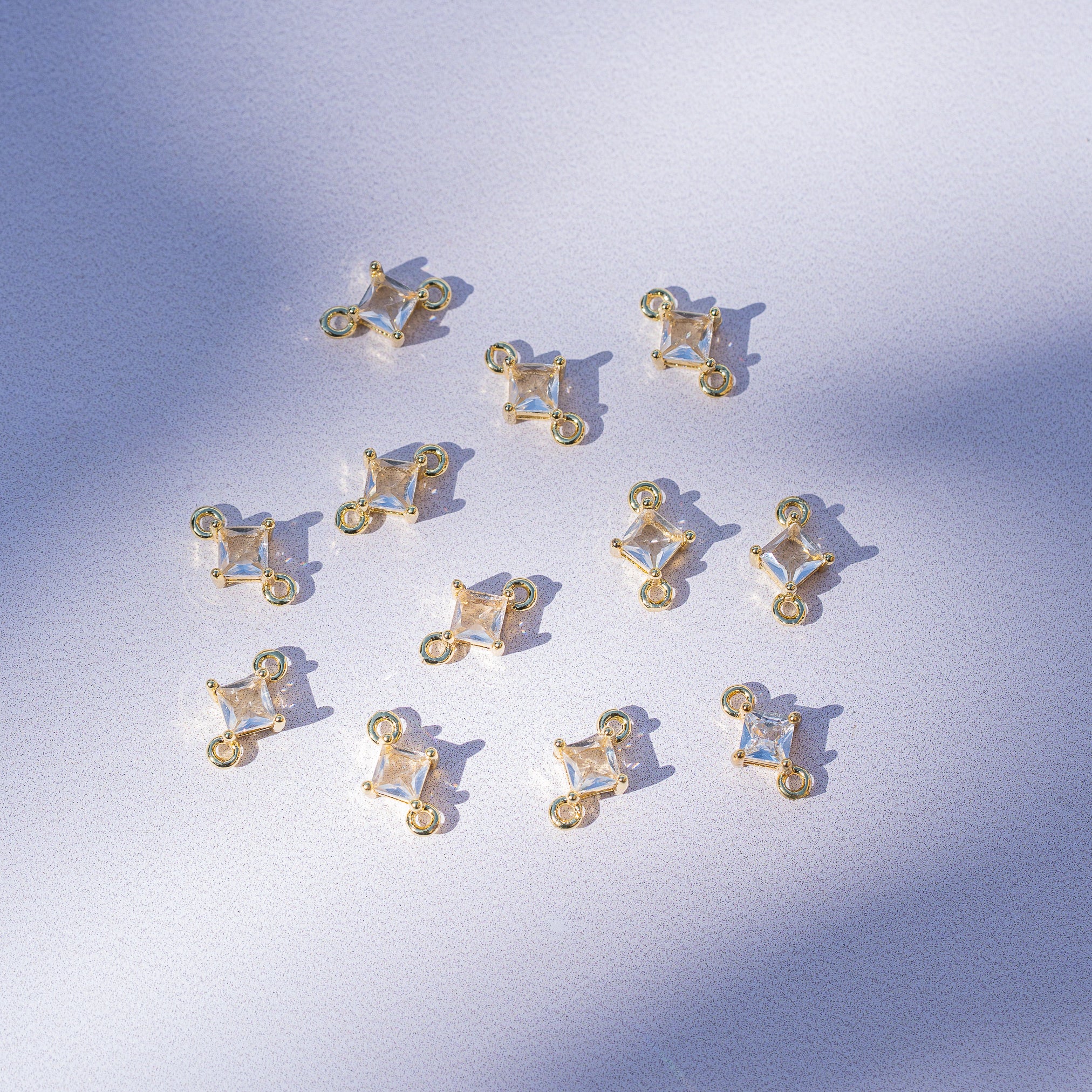 Connecteur losange en laiton plaqué or 18 k et zirconium de 10,5 mm ( à l&