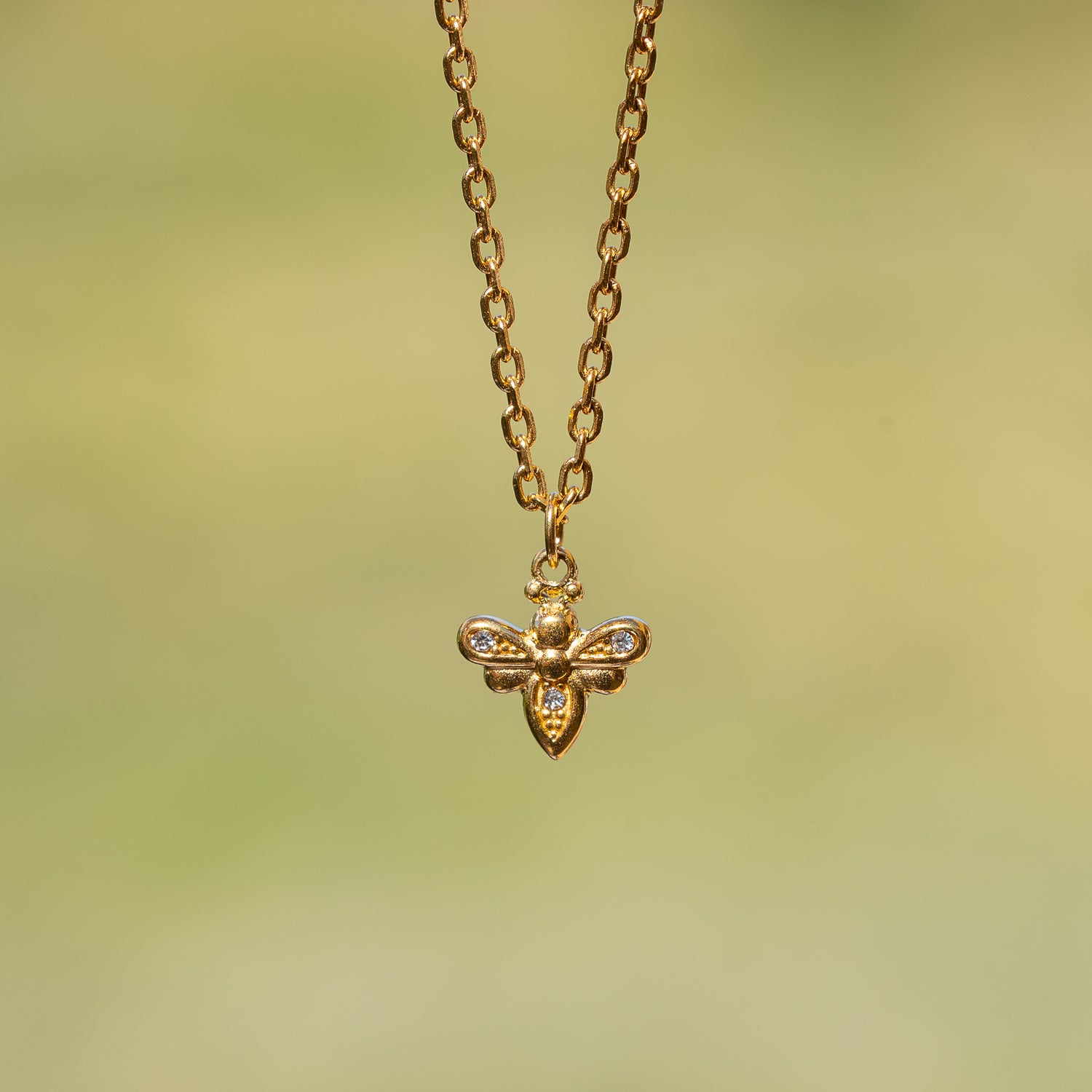 Breloques abeilles en acier inox plaqué or 18k et zirconium de 11 mm ( à l&