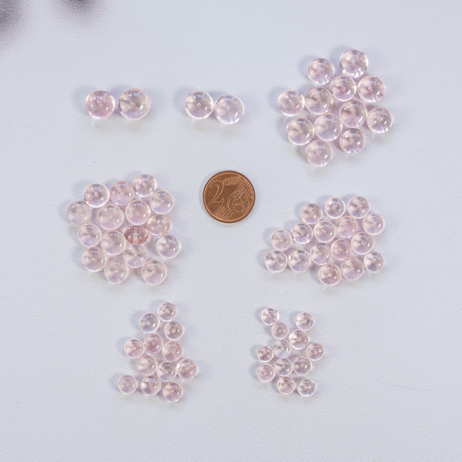 Perles rondelles lisses de Quartz rose de 6 à 10 mm ( lot de 2 )